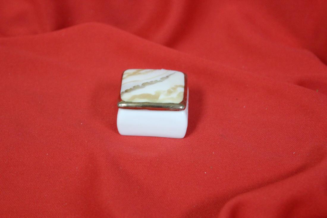 A Ceramic Pill Box: 1 1/4" square