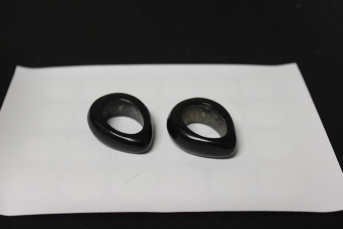 A Pair of Amber Style Napkin Rings: as shown on photos