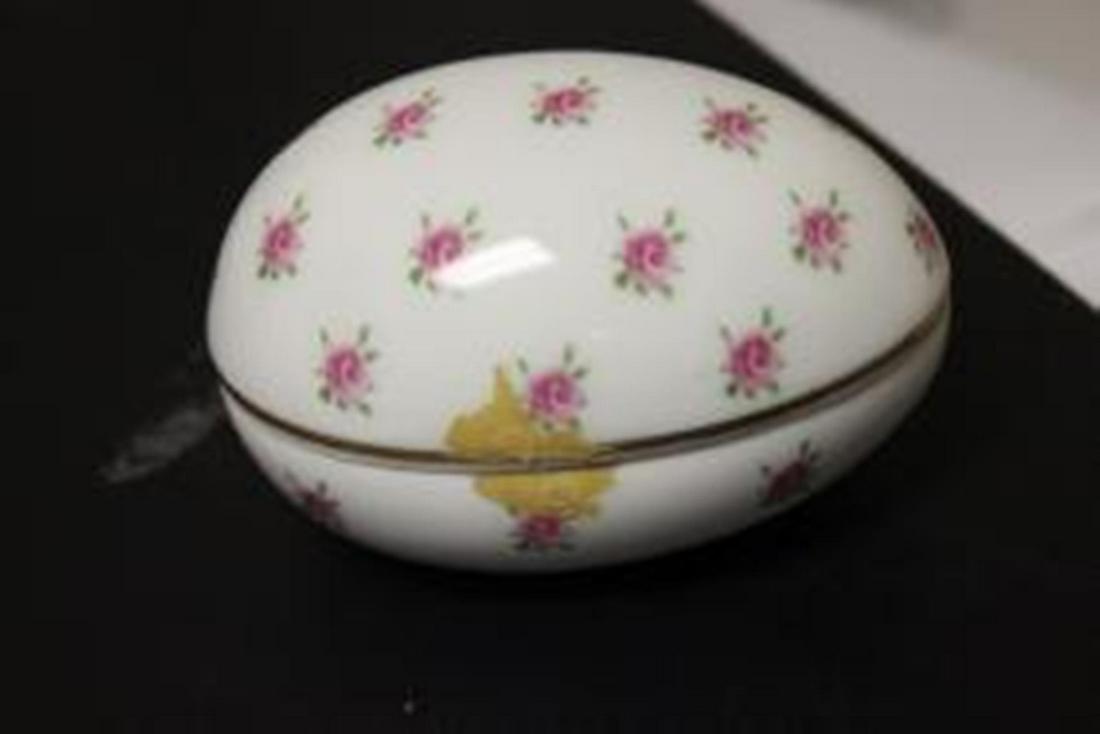 A Porcelain Egg Trinket Box: 4 3/8" long - please note tape residue