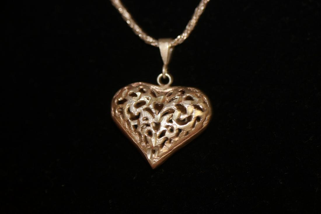 A Sterling Neckalce and Locket: as shown
