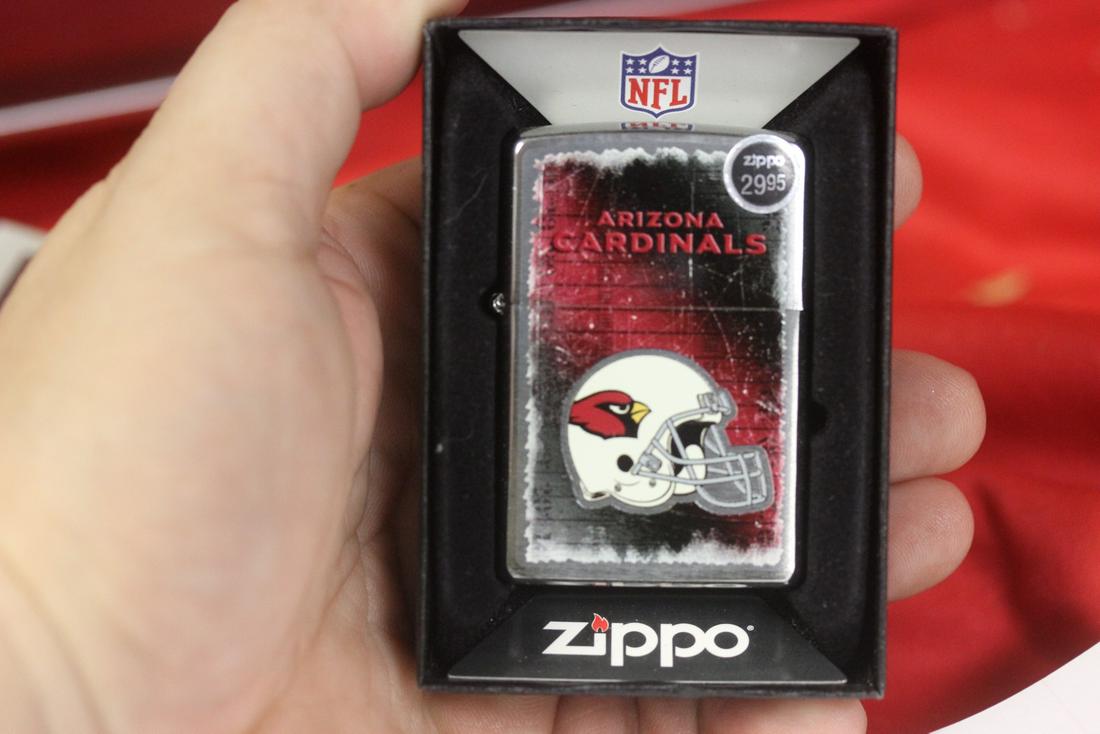 An NFL Zippo Lighter: unused