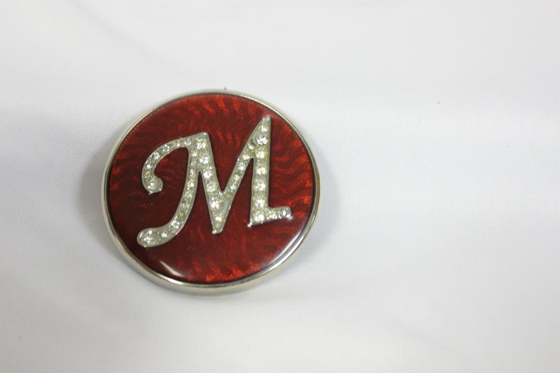 An Enamel Compact: 2 1/8" in diameter