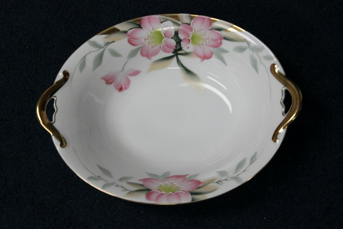 A Noritake Oval Vegetable Bowl: 9 5/8 inches from handle to handle azalea pattern - red noritake mark