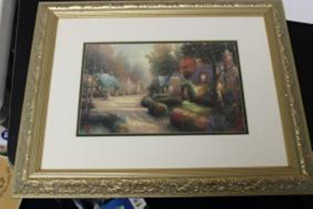 A Framed Thomas Kinkade Print: Overall= 19 1/4" x 15 1/4" - sight= 11" x 7"