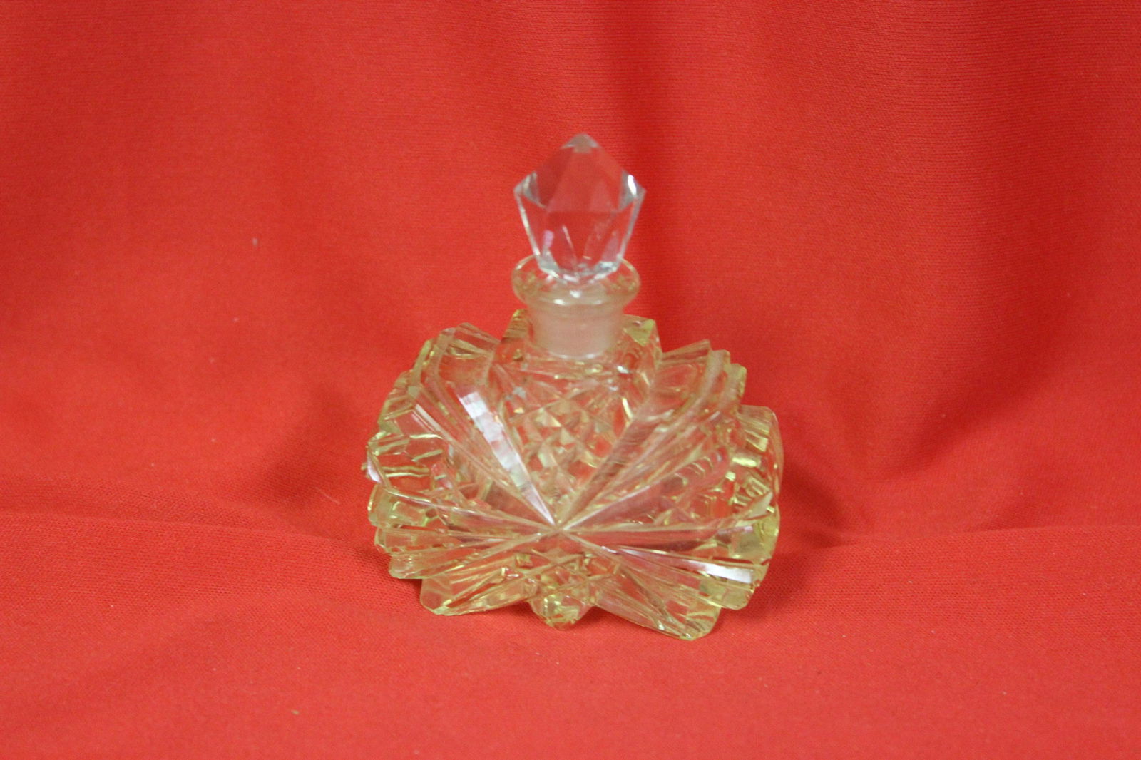 A Cut Glass Perfume Bottle: 3 3/4" tall