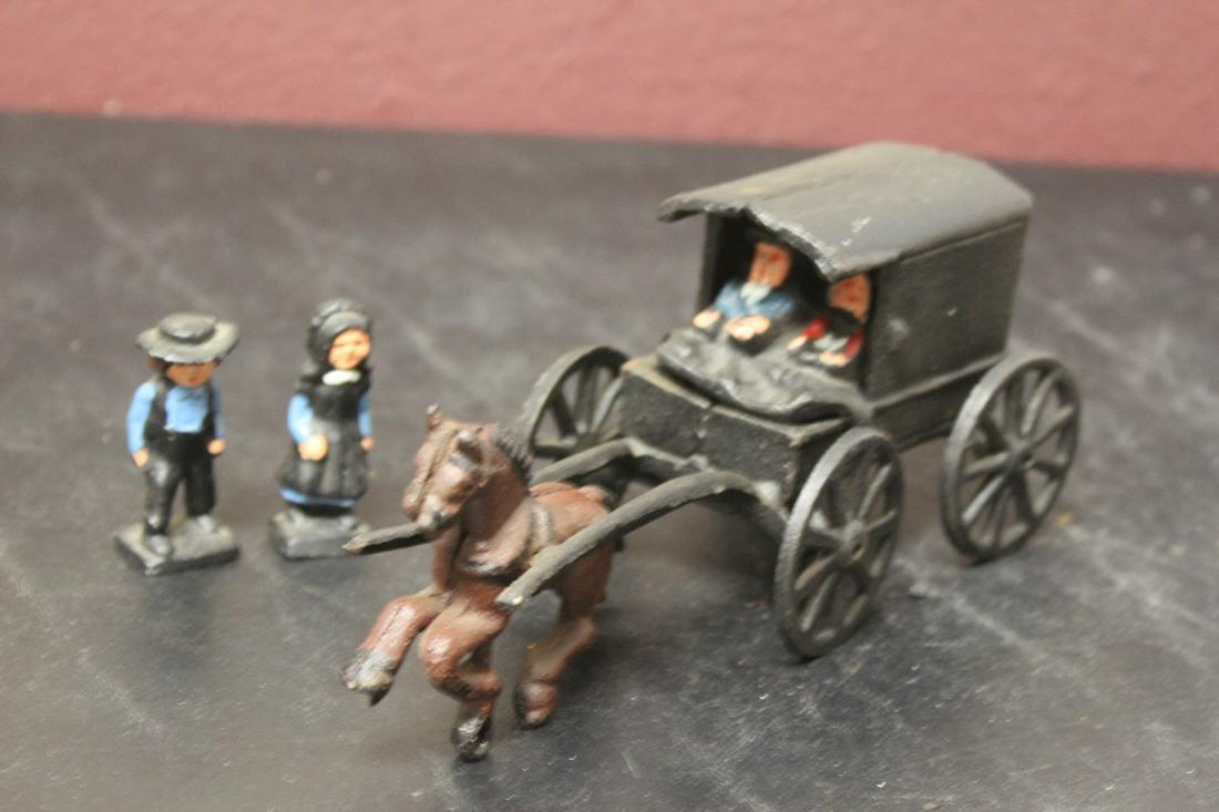 An Amish Carriage with Horse and Bystanders: 8 1/2" long when attached