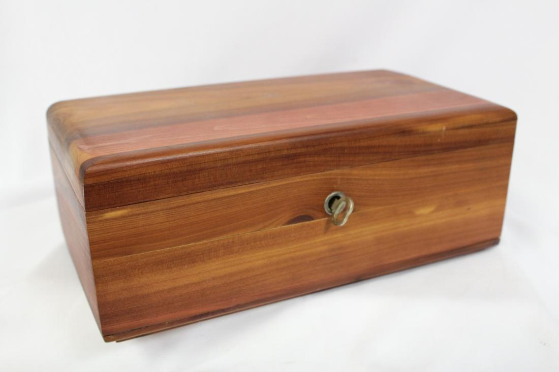 A Cedar Box With key: 9" x 3 1/2" x 4 3/4"