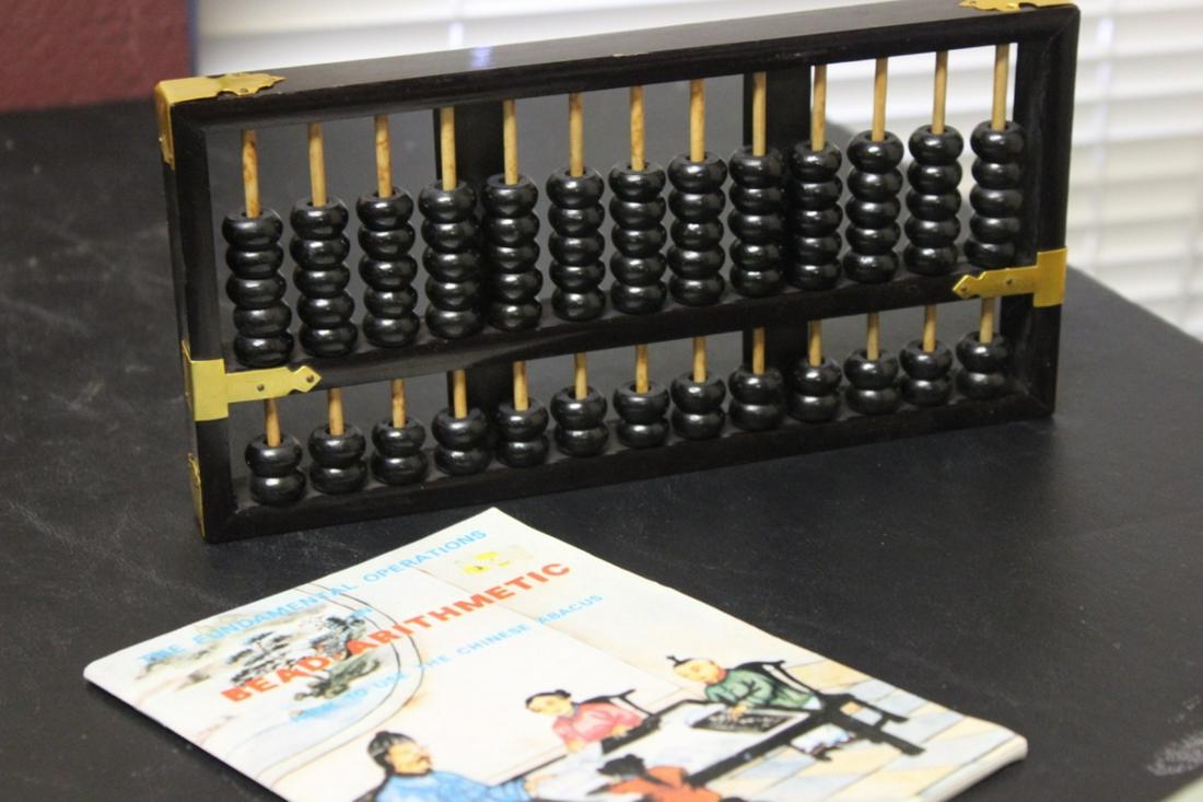 An Abacus: with instruction book - 9 3/4" long
