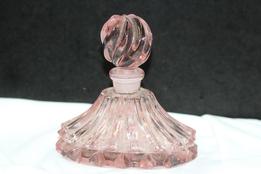 A Purple Glass Perfume Bottle: stopper stuck to the mouth - 4 3/4" tall