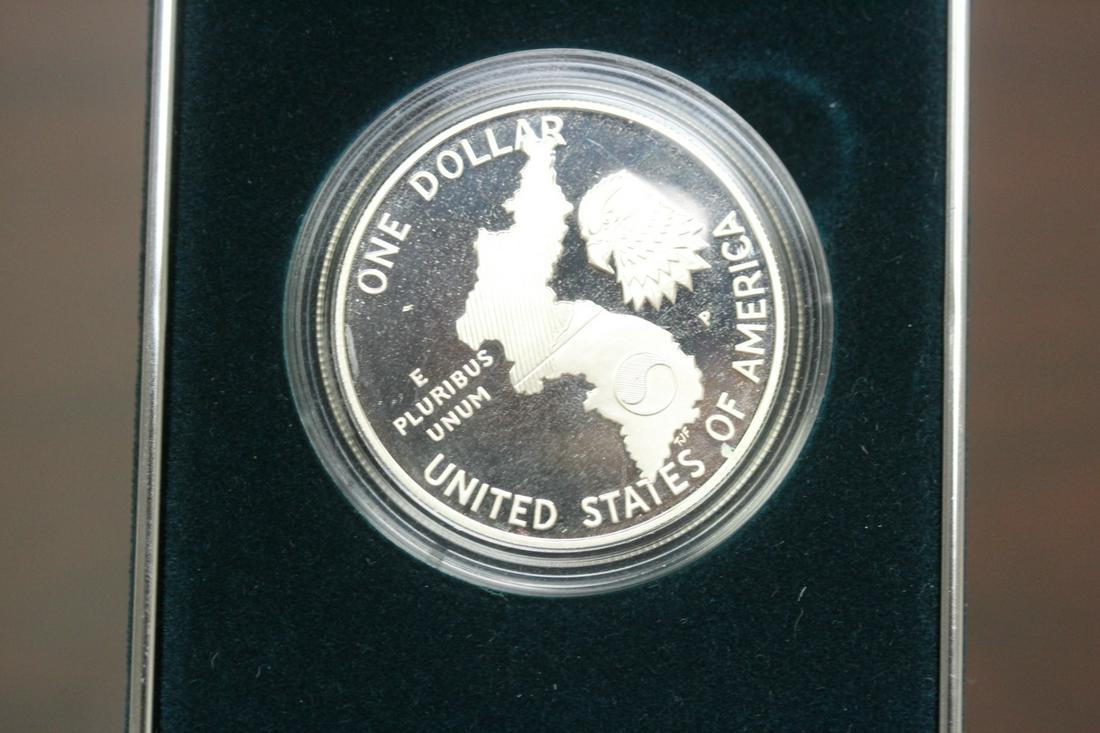 A 1991 Korean War Memorial Coin: Proof Silver Dollar - 90% proof, with COA
