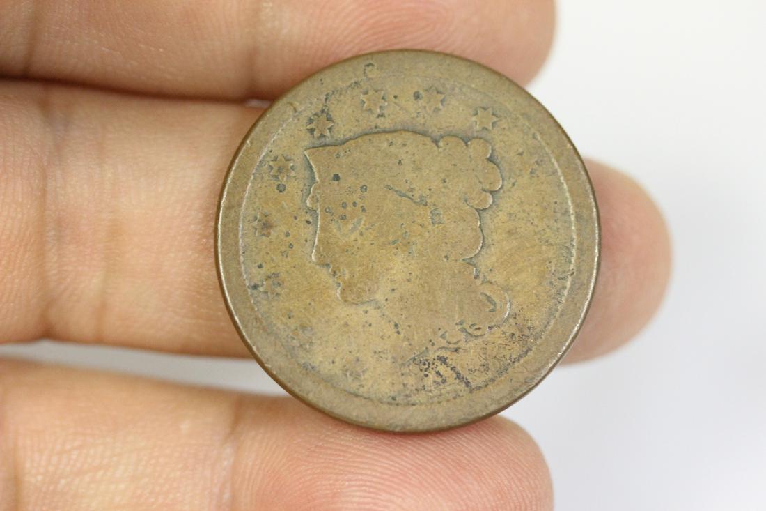 An 1853 Large Cent: as shown on photos