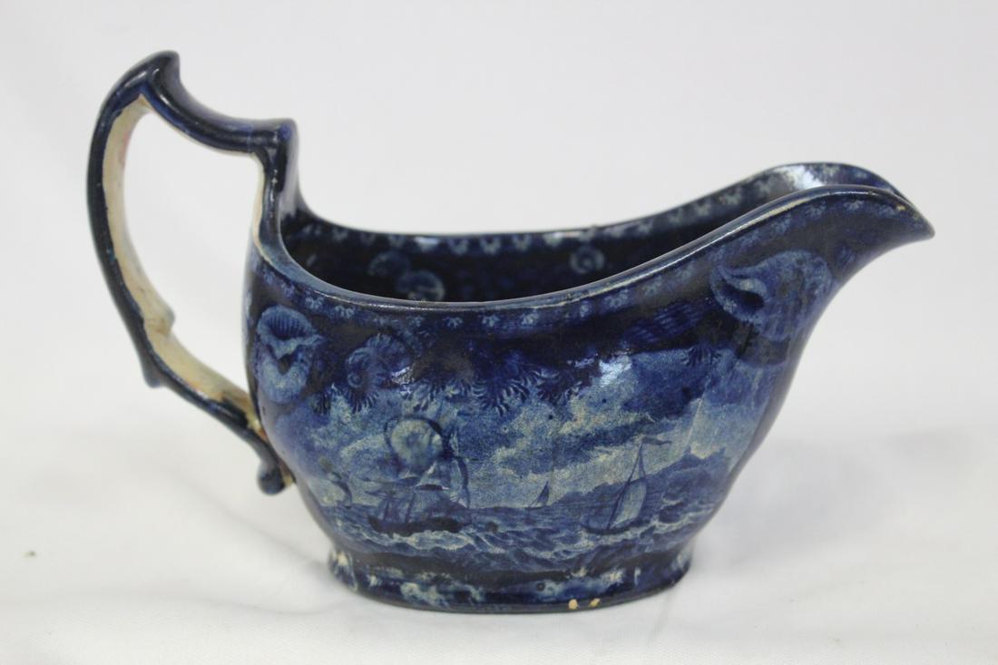 A Flow Blue Creamer: please note: hairlines - 6 1/2" across