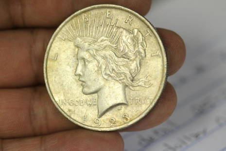 A 1923 Peace Silver Dollar: as shown