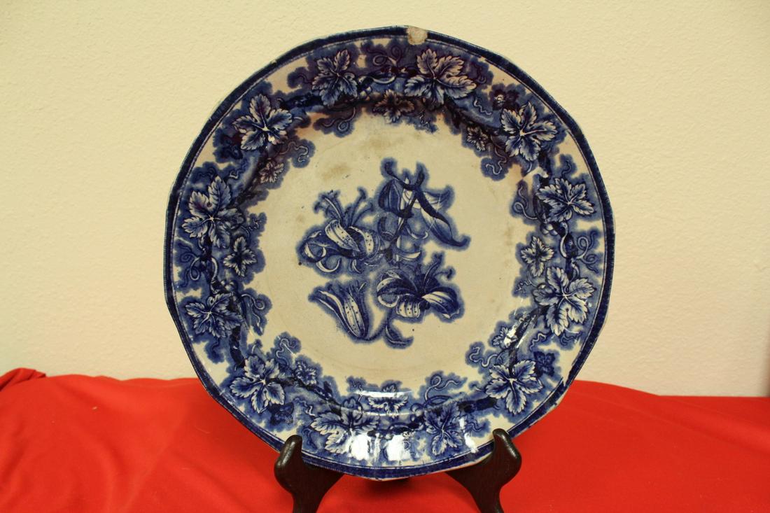 A Vintage Flow Blue Plate: 10 1/2" in diameter - please note: chipped as shown