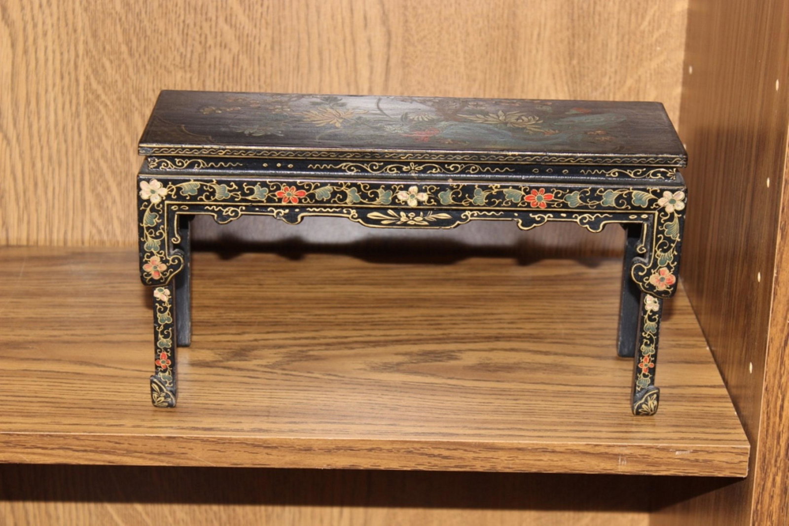 Antique Chinese Black Lacquer Stand / Mini Table: Marked 'China' on the bottom, most likely circa early 20th century. This is a beautifully designed piece. It measures 11" long by 6" tall by 4" deep.