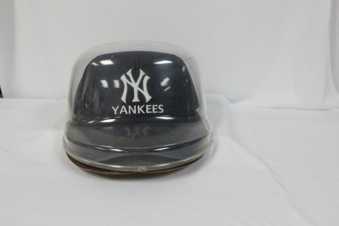 A Signed Yogi Berra Baseball Cap: with COA