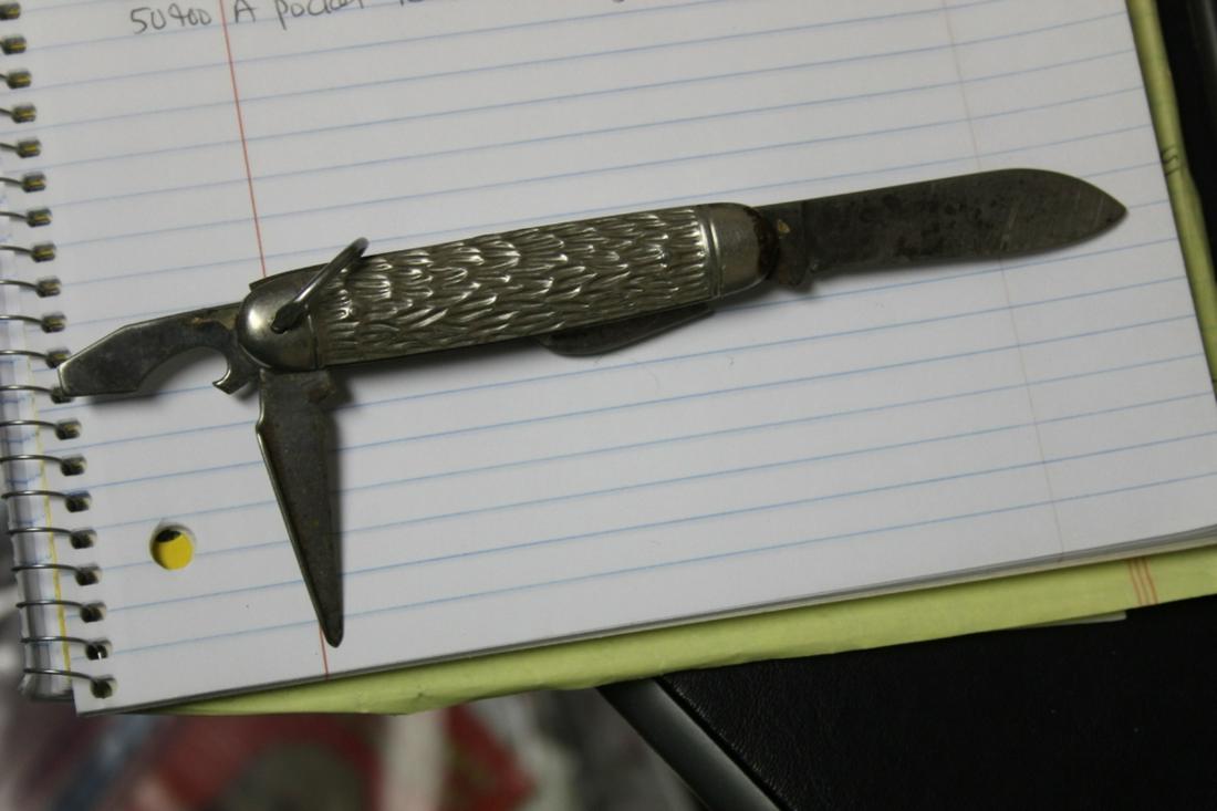 A Kamp King 4 Blades Pocket Knife: as shown on photos