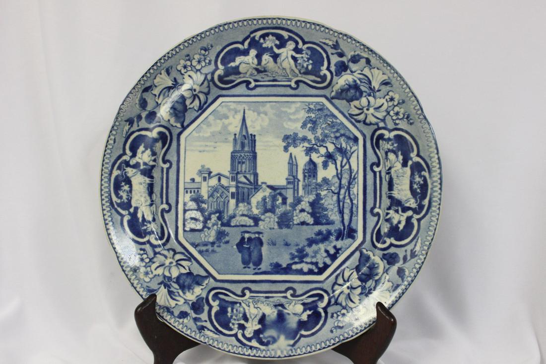 An Antique Flow Blue Plate: 9 3/4" in diameter
