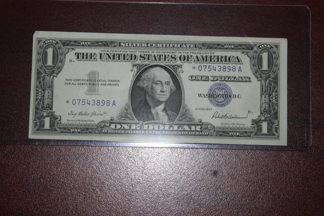 A Blue Seal One Dollar Crisp Silver Certificate: star note