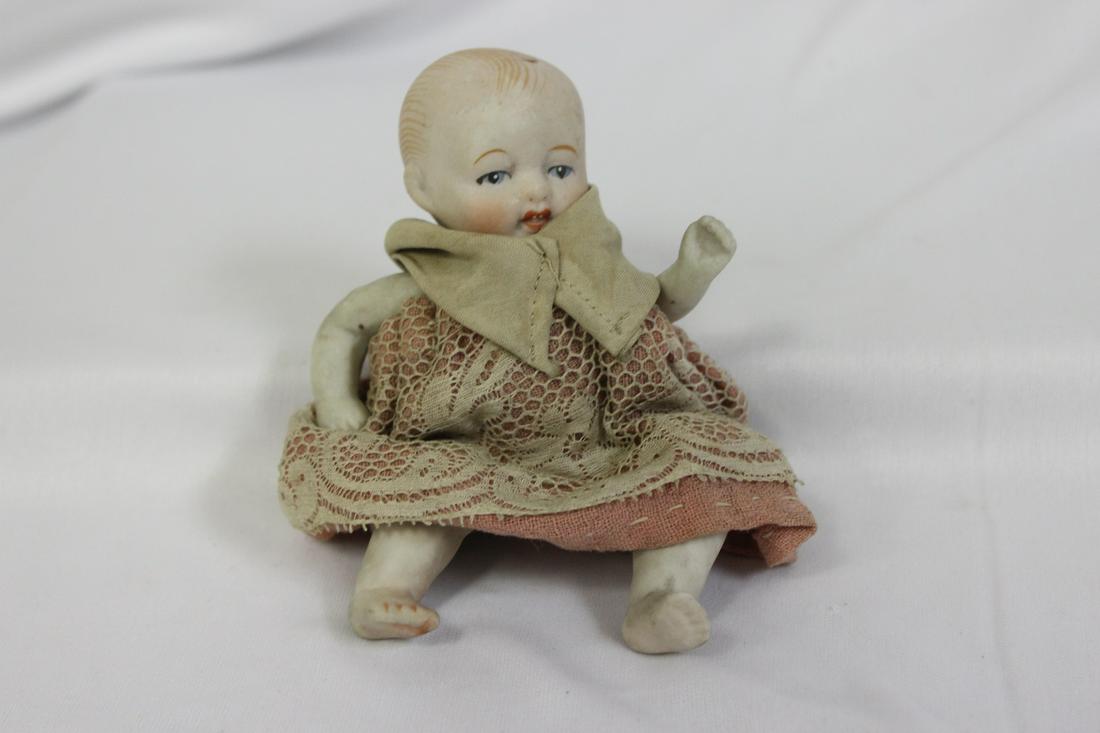 A Nippon Joint Bisque Doll: 4 1/2" tall