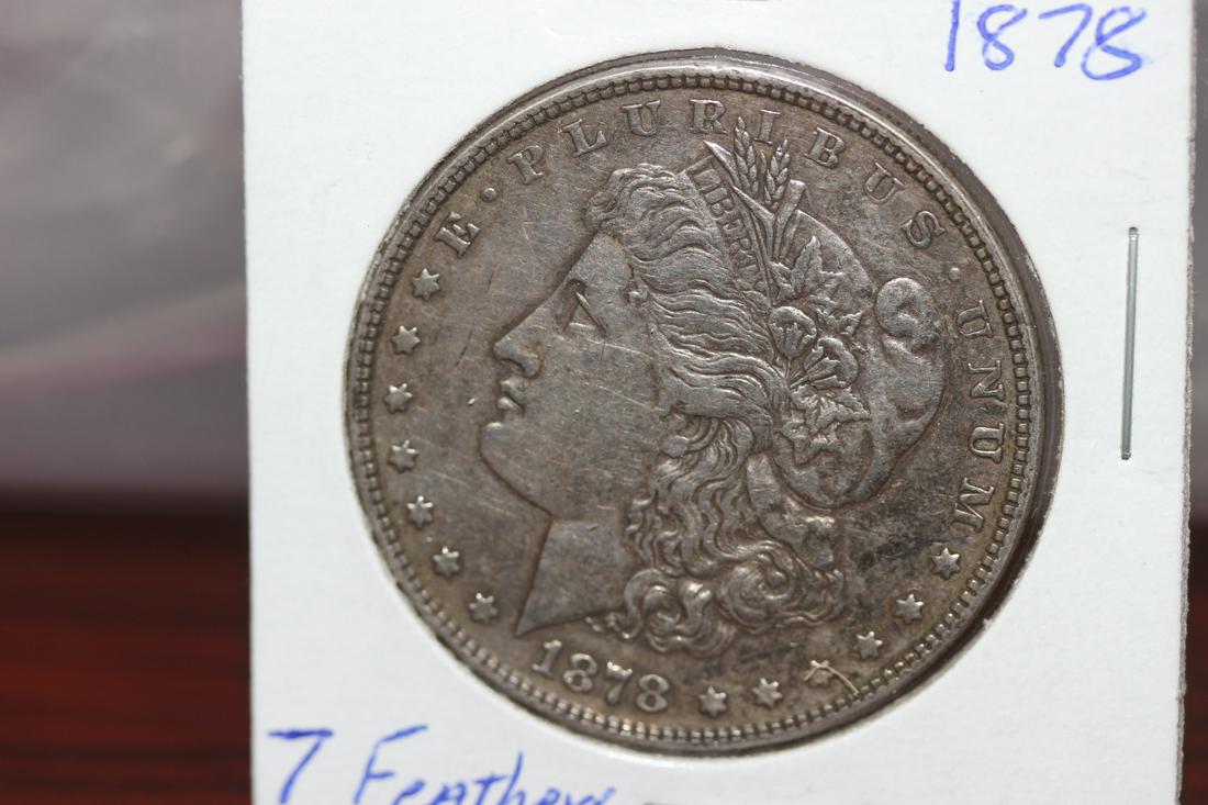 An 1878 Morgan Silver Dollar: as shown