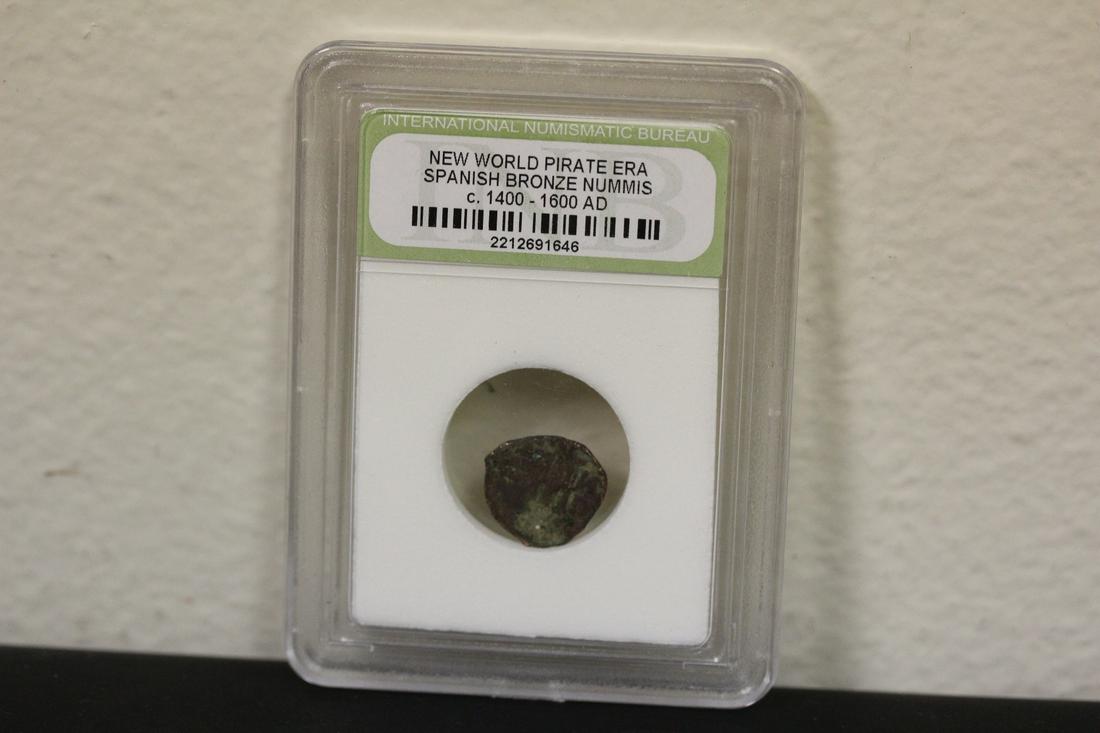 A Slabbed Spanish Bronze Nummis Coin: New World pirate era - c1400-1600 AD