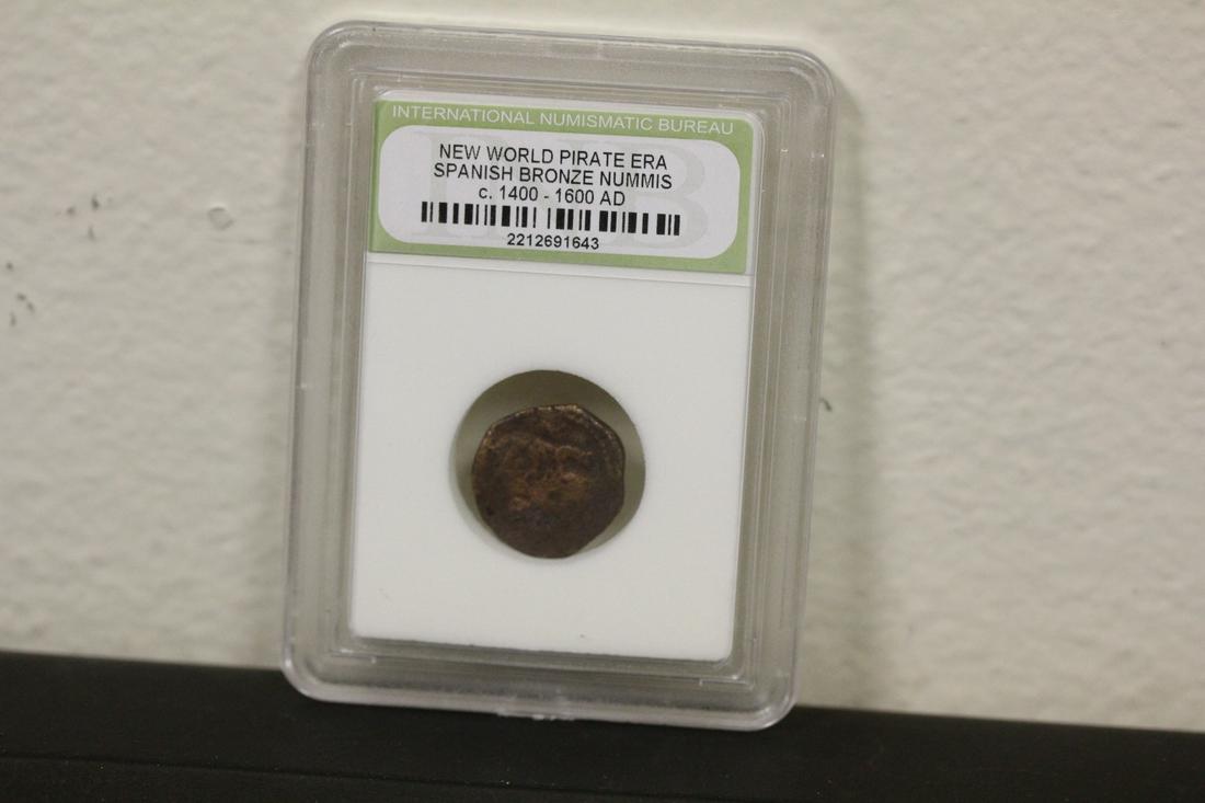 A Slabbed Spanish Bronze Nummis Coin: New World pirate era - c1400-1600 AD