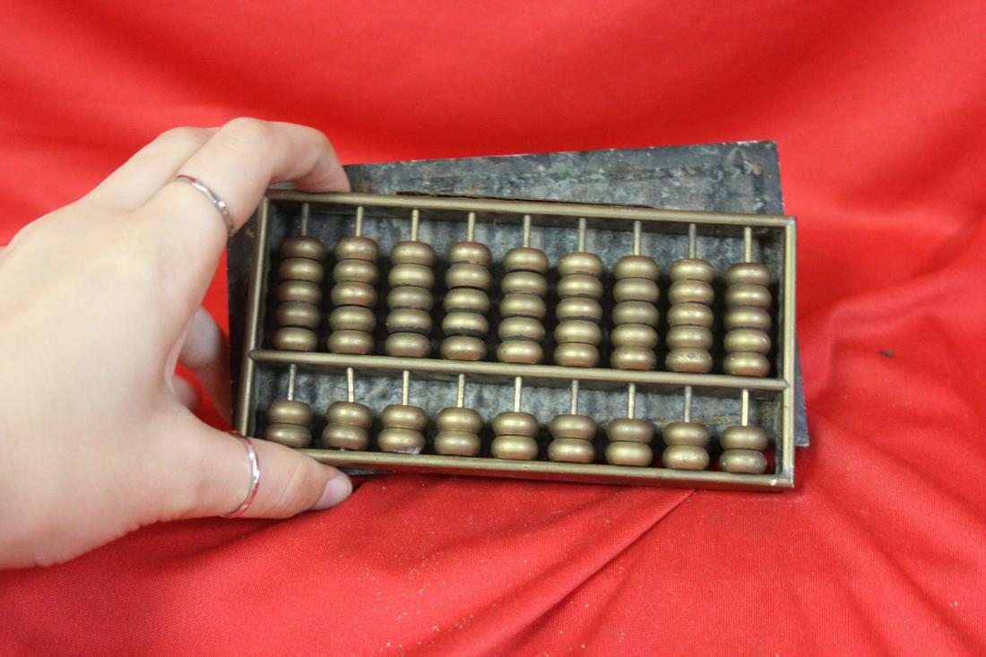 A Chinese Brass Abacus on Marble Stand: Two separate pieces - 5 3/4" long