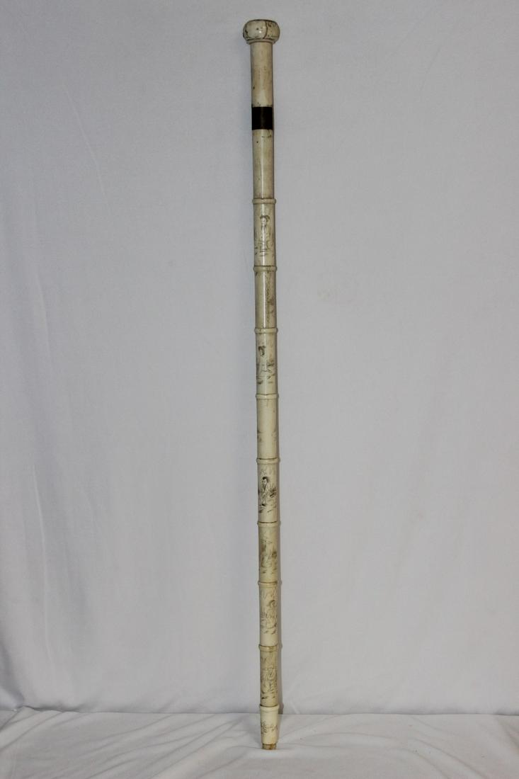 A Chinese Carved Bone and Cane Sword: please note: no tip - 34 1/2" long