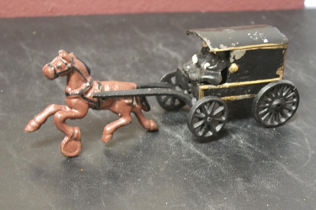 An Amish Carriage with Horse: 9 7/8" long - cast iron