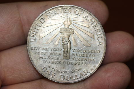 1986-S Ellis Island Silver Dolalr: as shown