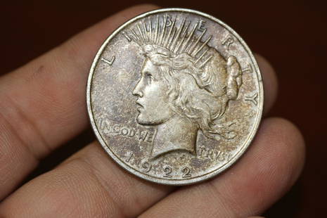 A 1922 Peace Silver Dollar: as shown