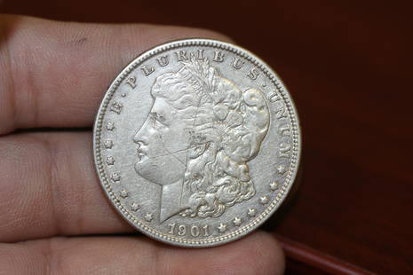 A 1901-O Morgan Silver Dollar: as shown