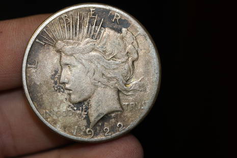 A 1922-S Peace Silver Dollar: as shown
