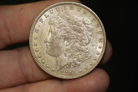 An 1881 Morgan Silver Dollar: as shown
