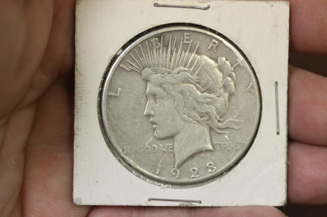 A 1923-S Peace Silver Dollar: as shown