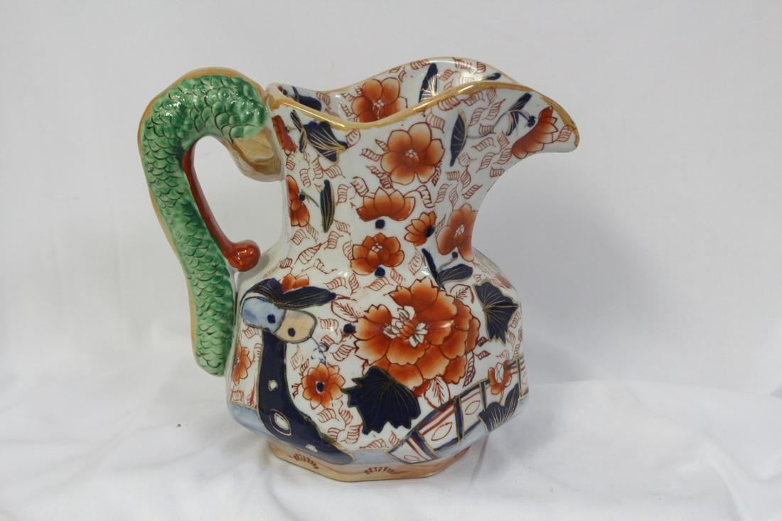 An Oriental Motif Pitcher by Ironstone: 6 3/4" tall