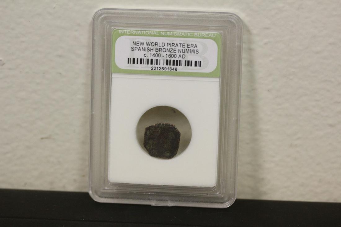 A Slabbed Spanish Bronze Nummis Coin: New World pirate era - c1400-1600 AD