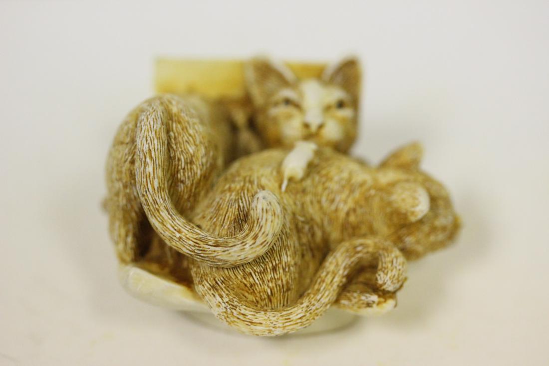 A Cat and Mouse Figurine: well made - unknown material - approximately 2 inches across