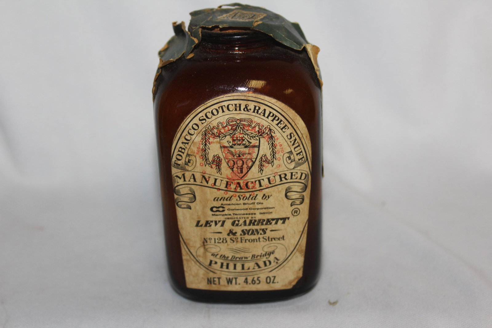 A Vintage Levi Garrett and Sons Snuff Bottle: 4.65 ounce - unopened?