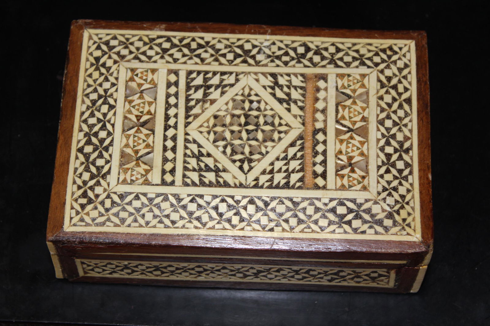 An Inlaid Wooden Box: 6 1/4" across