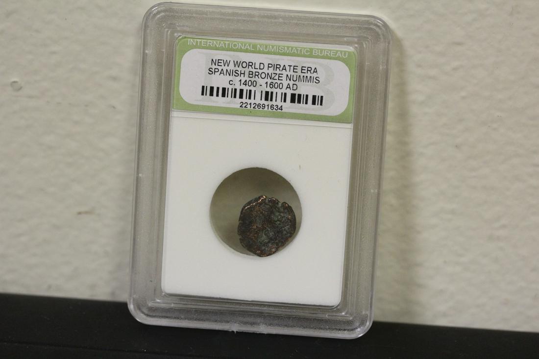 A Slabbed Spanish Bronze Nummis Coin: New World pirate era - c1400-1600 AD