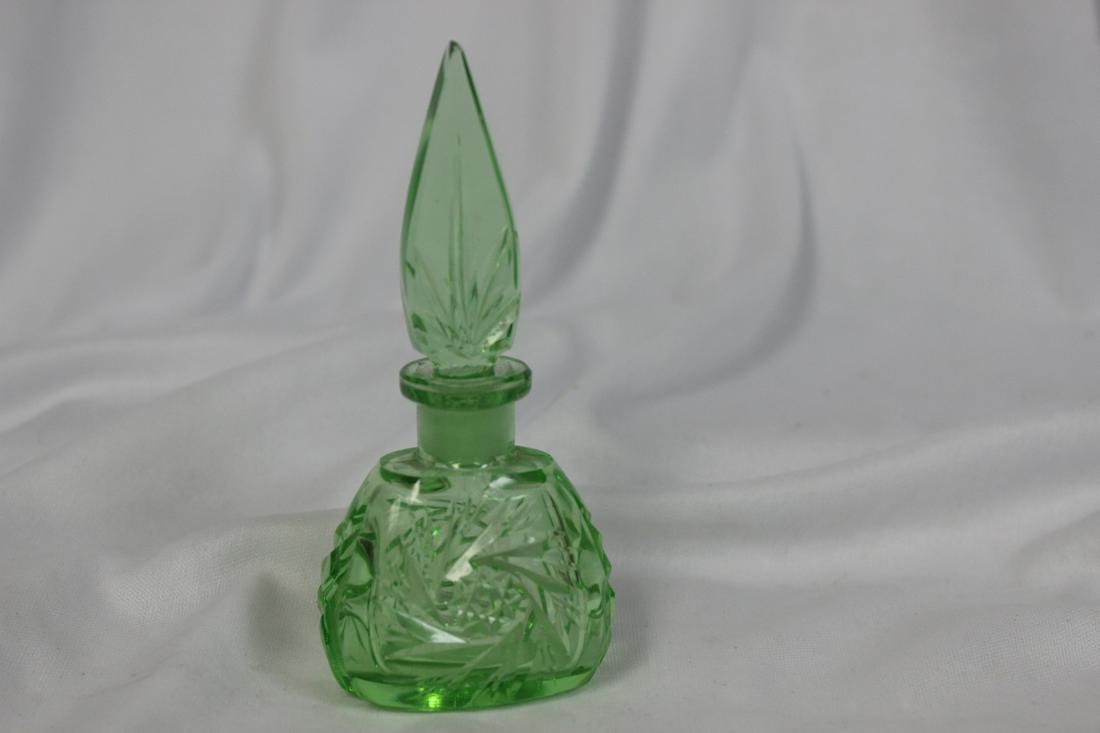 A Green Glass Perfume Bottle: 4 1/2" tall