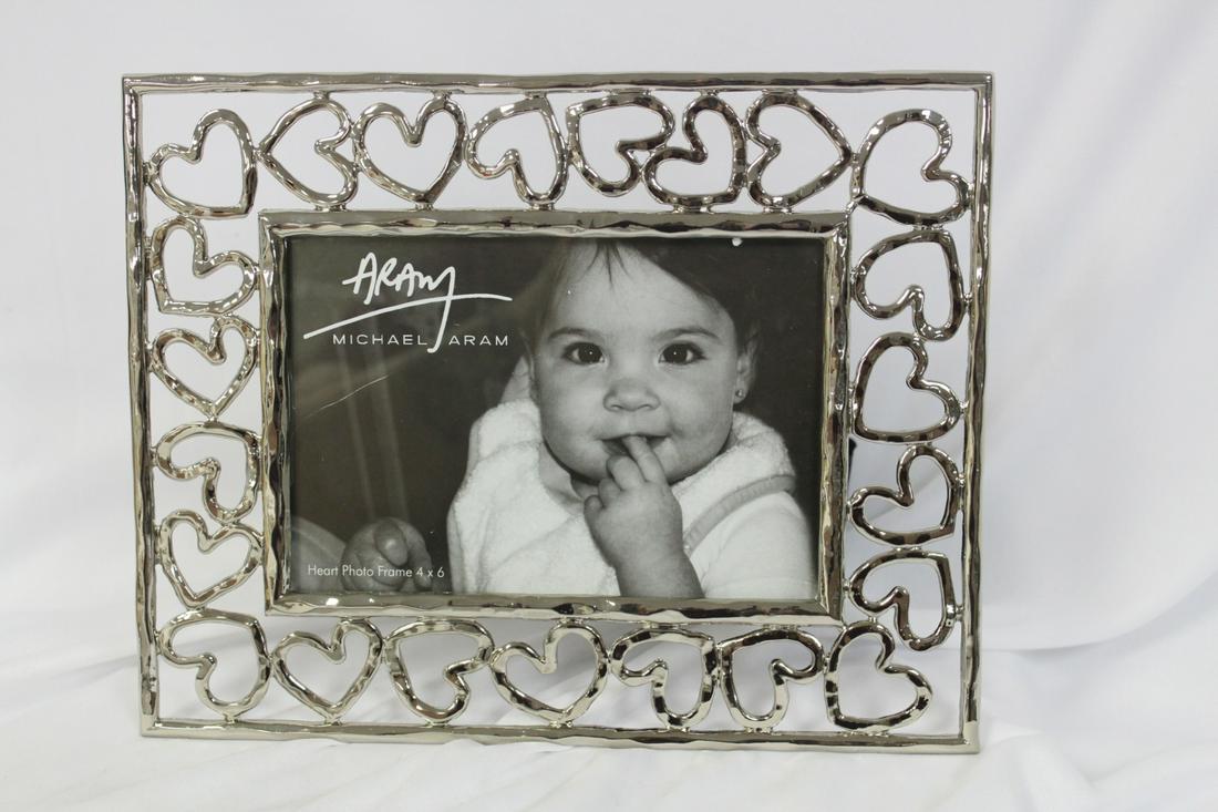 A Michael Aram Picture Frame: boxed - fits a 4" x 6" photo