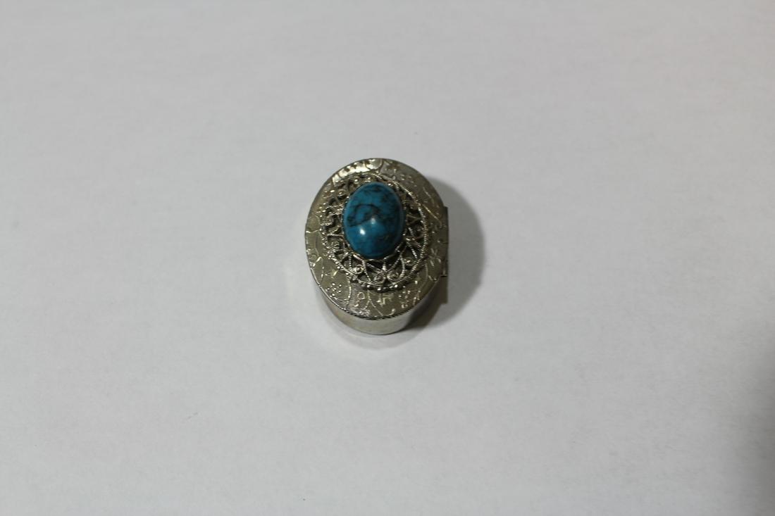 A Metal Pill Box: 1 1/2" in diameter