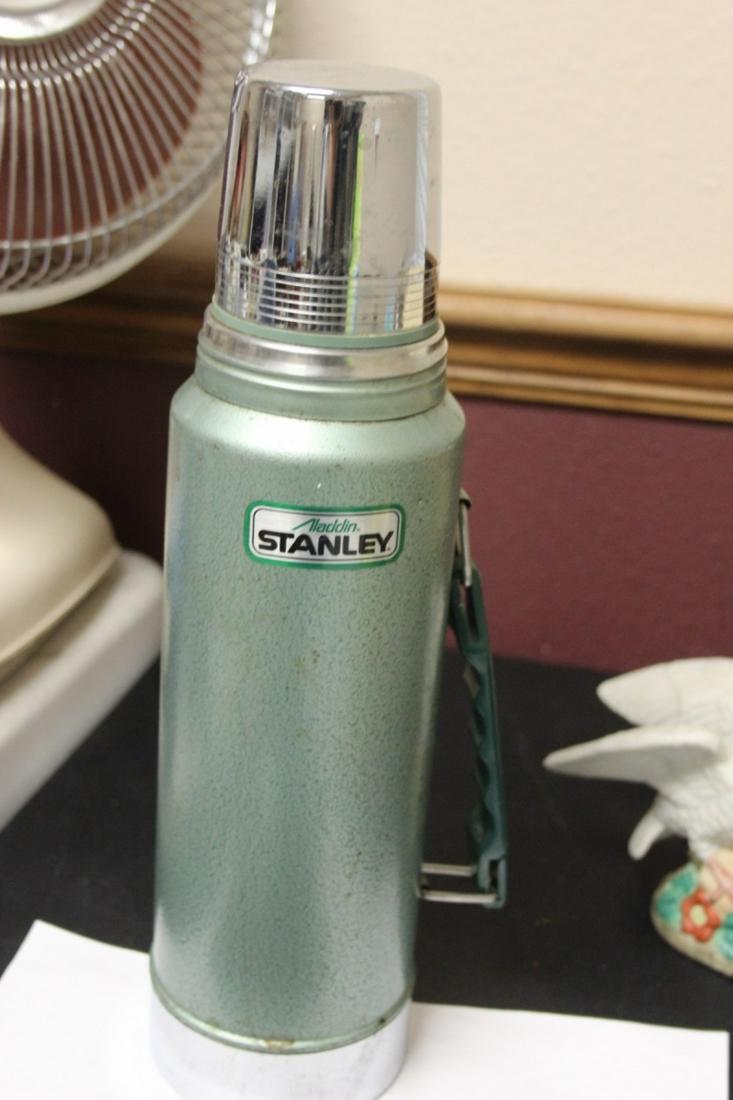 An Aladdin Stanley Coffee Thermos: 14 1/8" tall