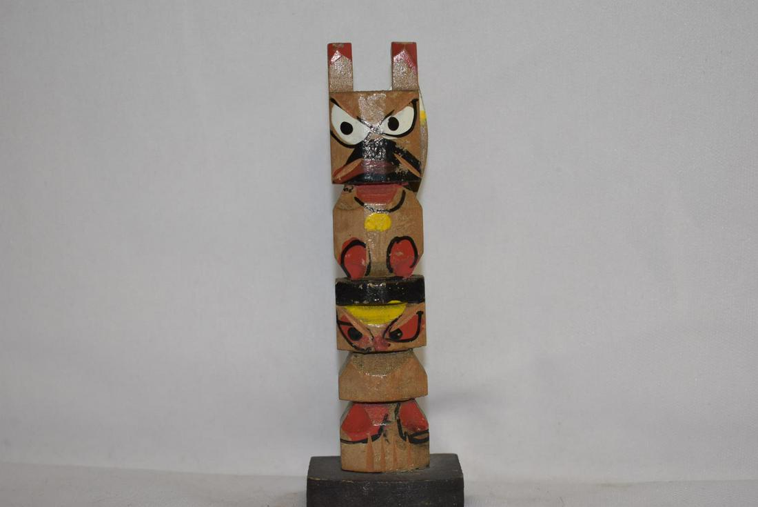 A Small Wooden Totem Pole: 4 3/8" tall