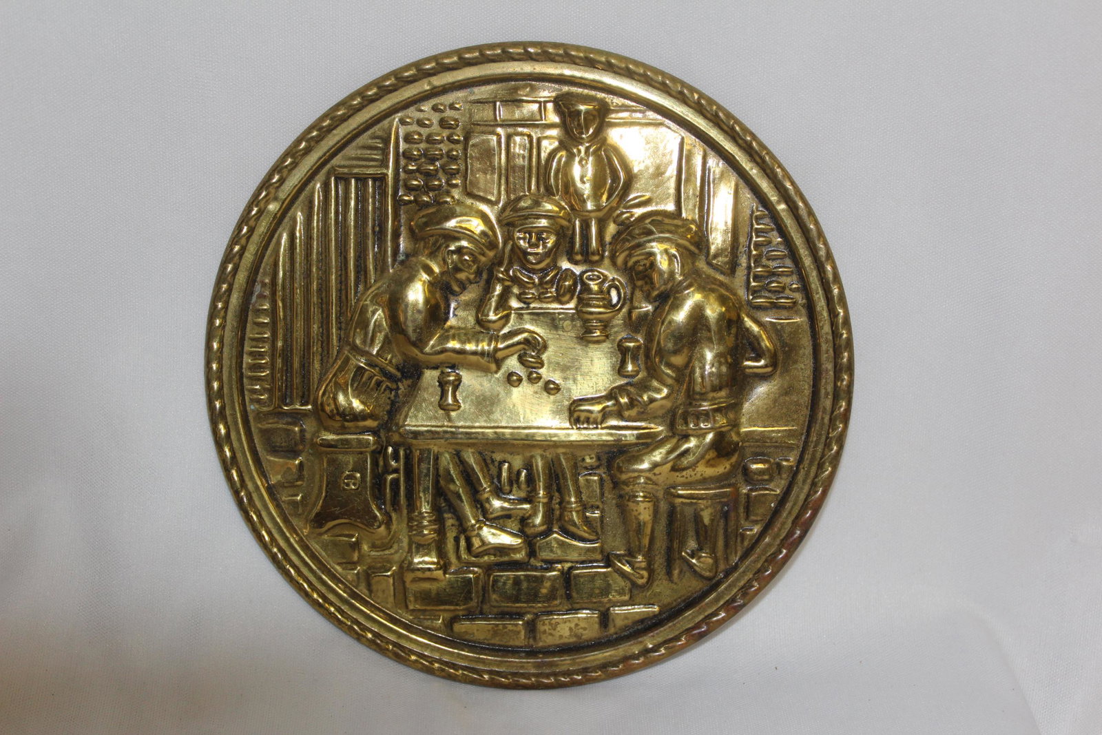 A Copper/Brass Wall Hanger: made in England - 6 3/8" in diameter