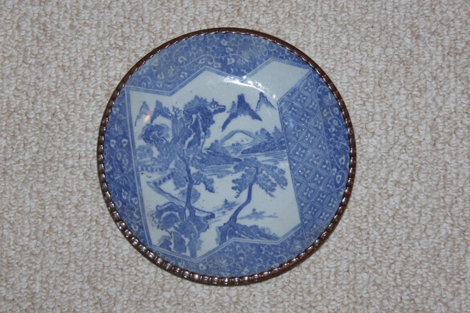 Antique Japanese Imari Blue and White Plate: 19th Century Edo Period. Measures 9 3/4" in diameter.