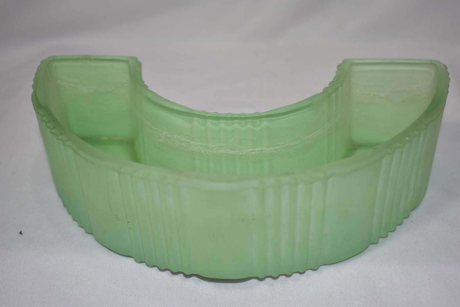 A Jadeite Glass Container: 8" across